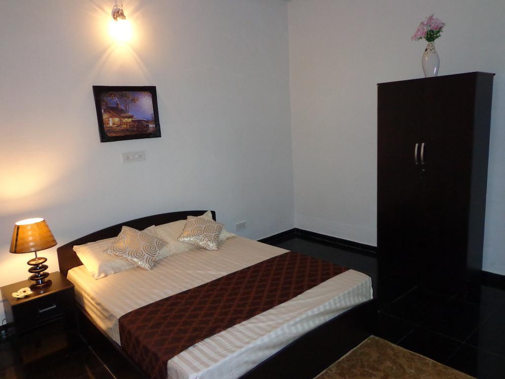 Remisha Service Apartments Madrás Habitación foto